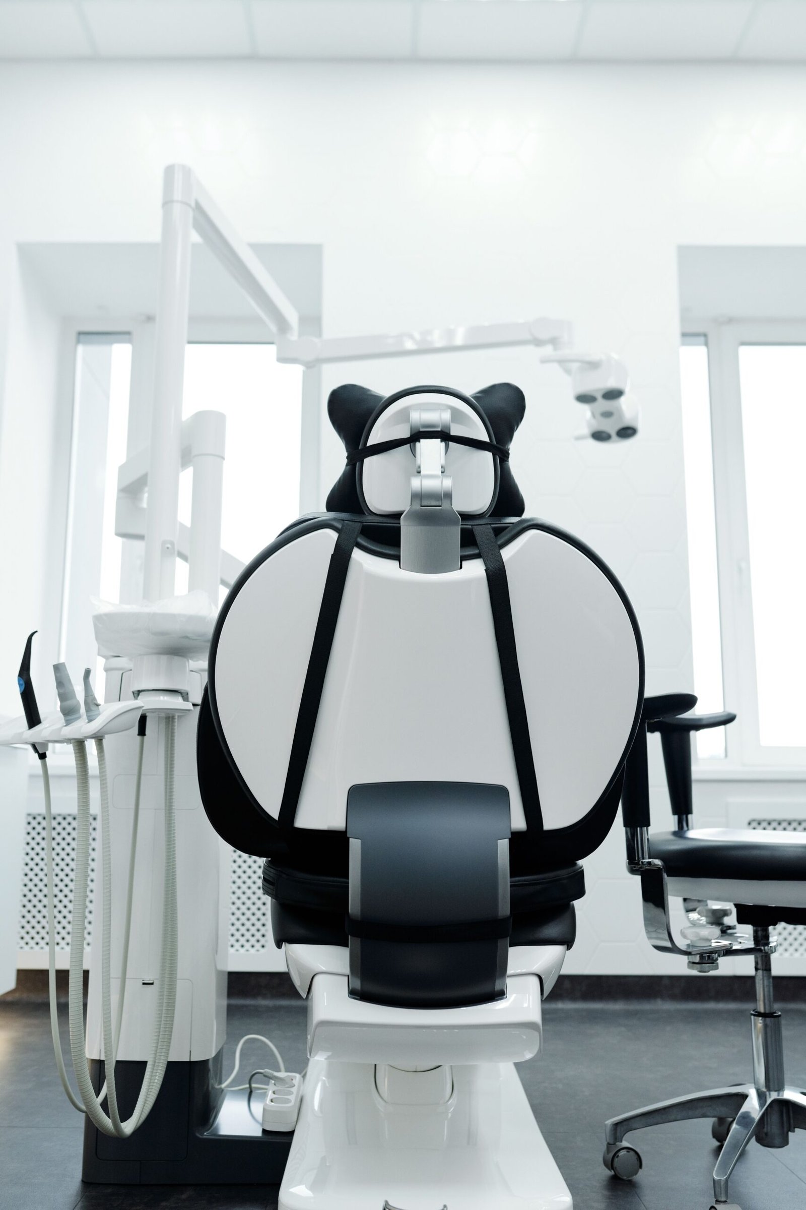 Modern dental clinic room with a dental chair