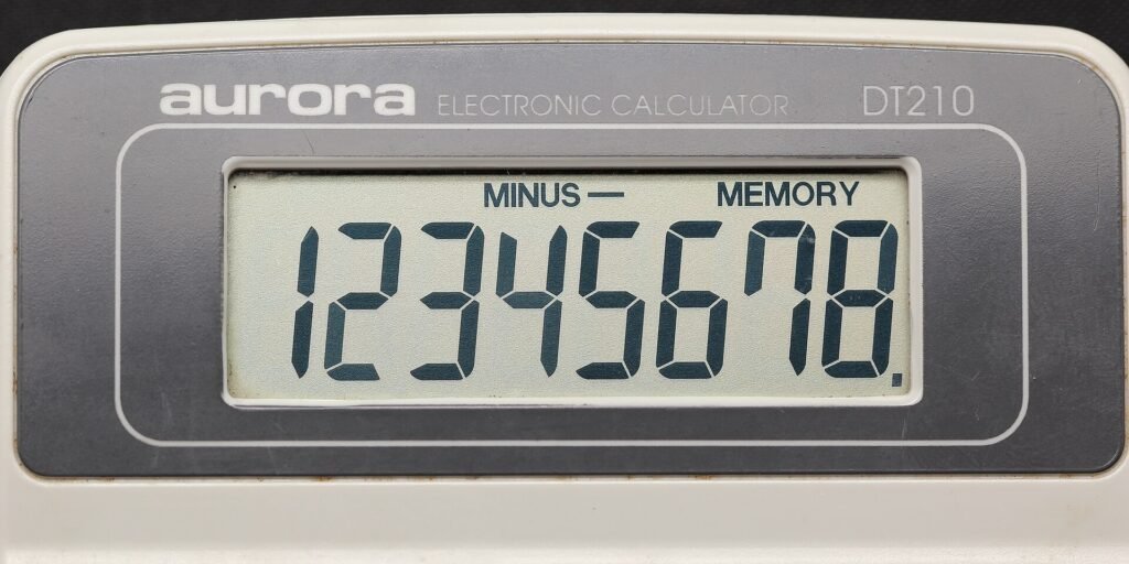 Aurora electronic calculator DT210 08, used to check hospital estimates and bills
