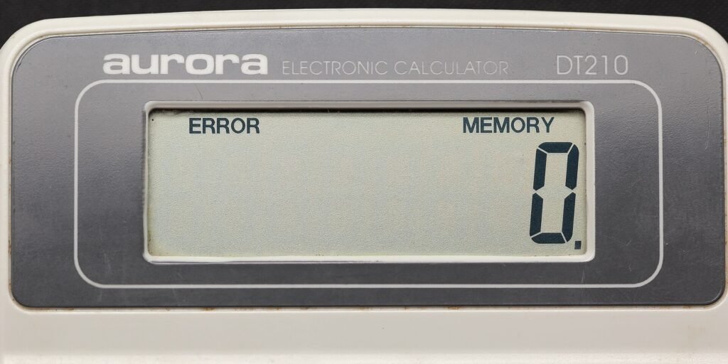 Aurora electronic calculator DT210 09, used to check an itemised hospital bill line by line