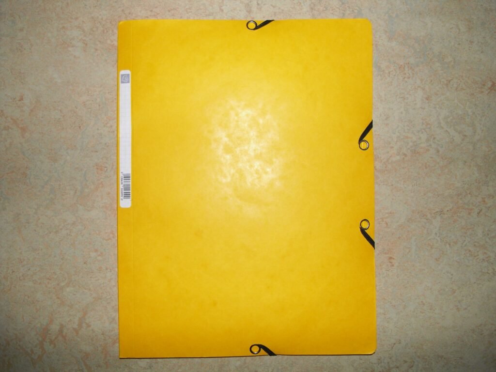 Yellow folder, representing claim documents kept together