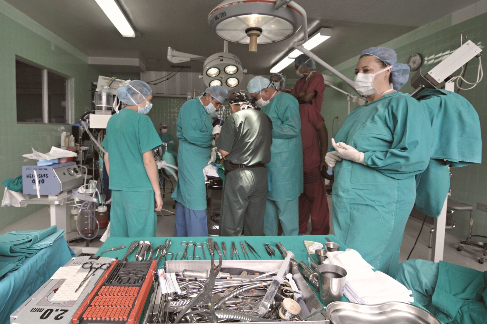 Medical team conducting surgery in a sterile OR