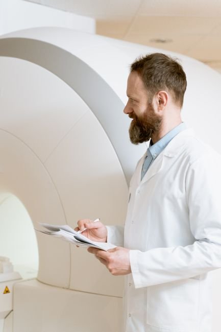 Doctor reviewing MRI scan results in a clinical setting