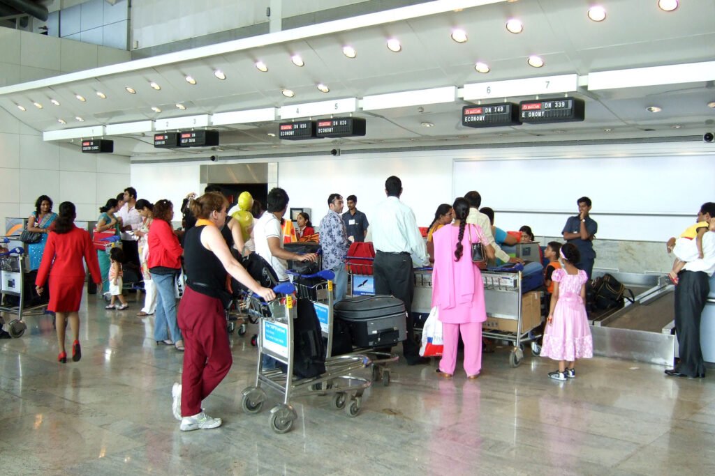 Check-in counter at Mumbai International Airport T1 for domestic flights, where travel for treatment often begins