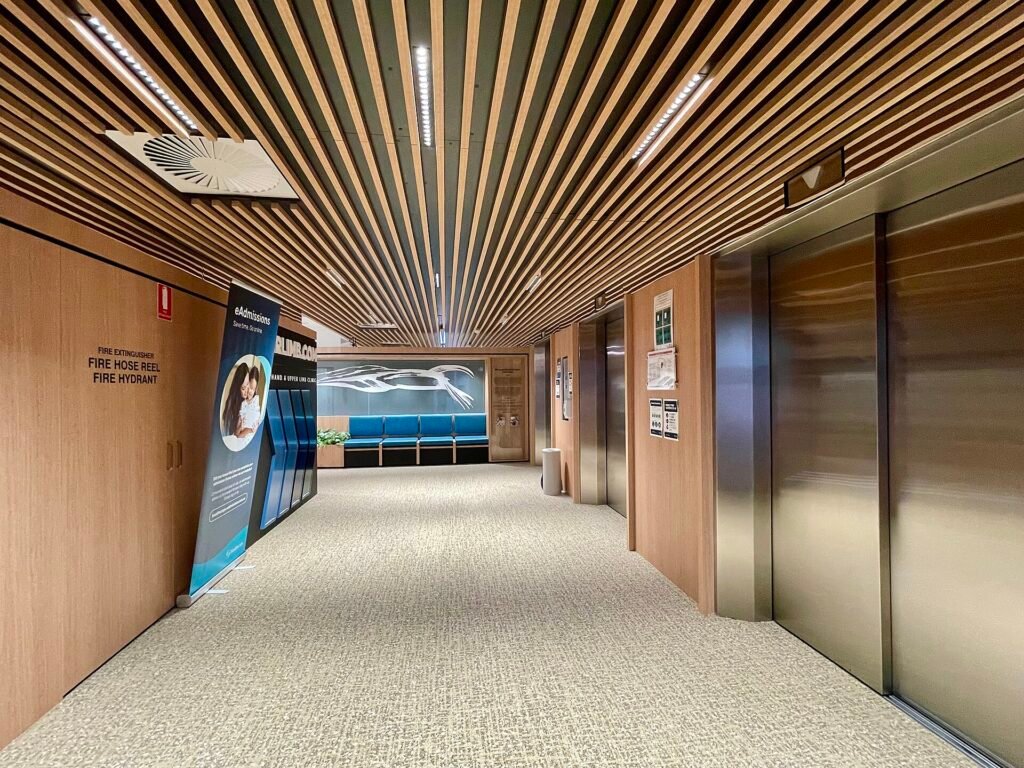 Lift lobby, Brisbane Private Hospital, 2021, a hospital entrance area where patients and families arrive